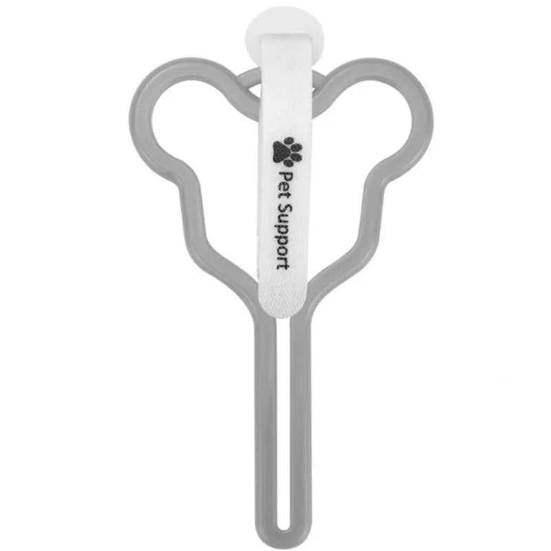 A dog poop bag holder with a Velcro strap, shown attached to a pet leash.