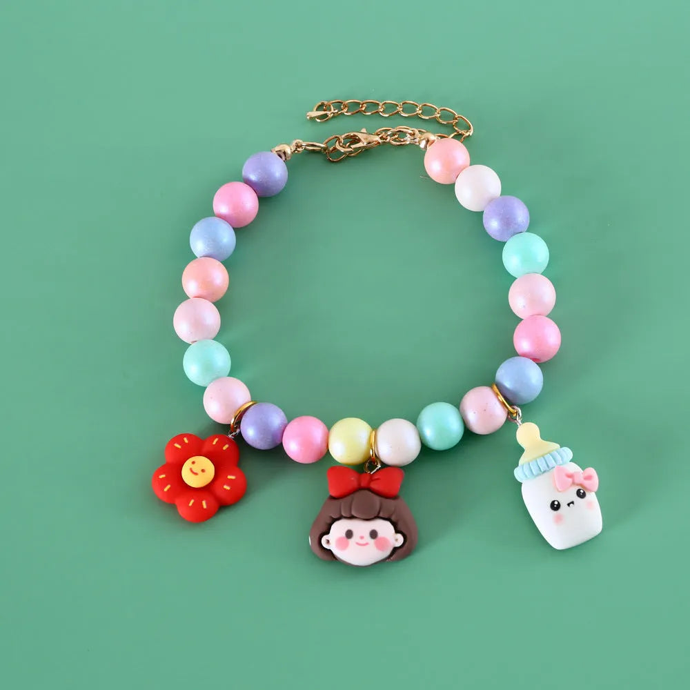 Macaron-coloured pet accessory set with resin headdress, collar, necklace and bracelet for photography