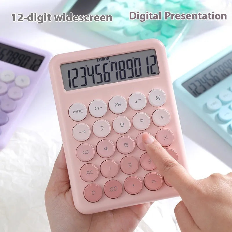 Dopamine gradient colour desk calculator in violet, pink, blue, or mint green on a desk.
