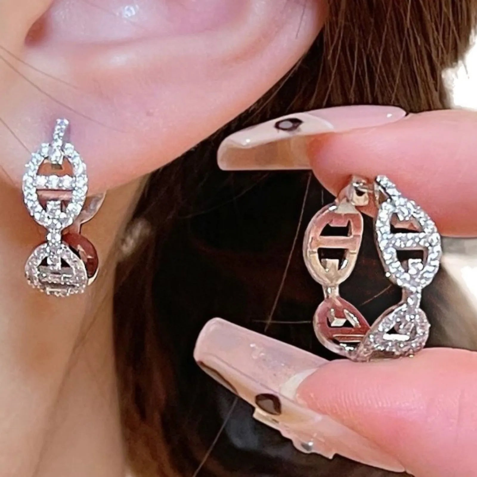 A pair of electroplated copper earrings with a diamond design in a choice of silver, gold, or rose gold thick plating.