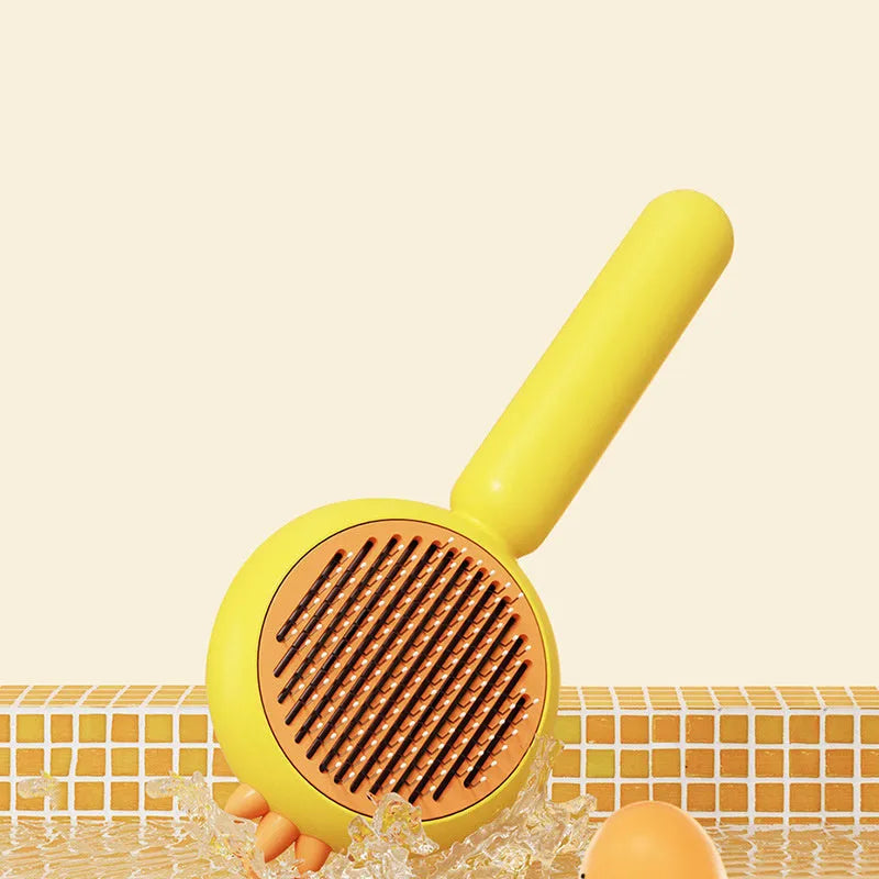 Purple self-cleaning pet grooming brush with stainless steel bristles on a white background