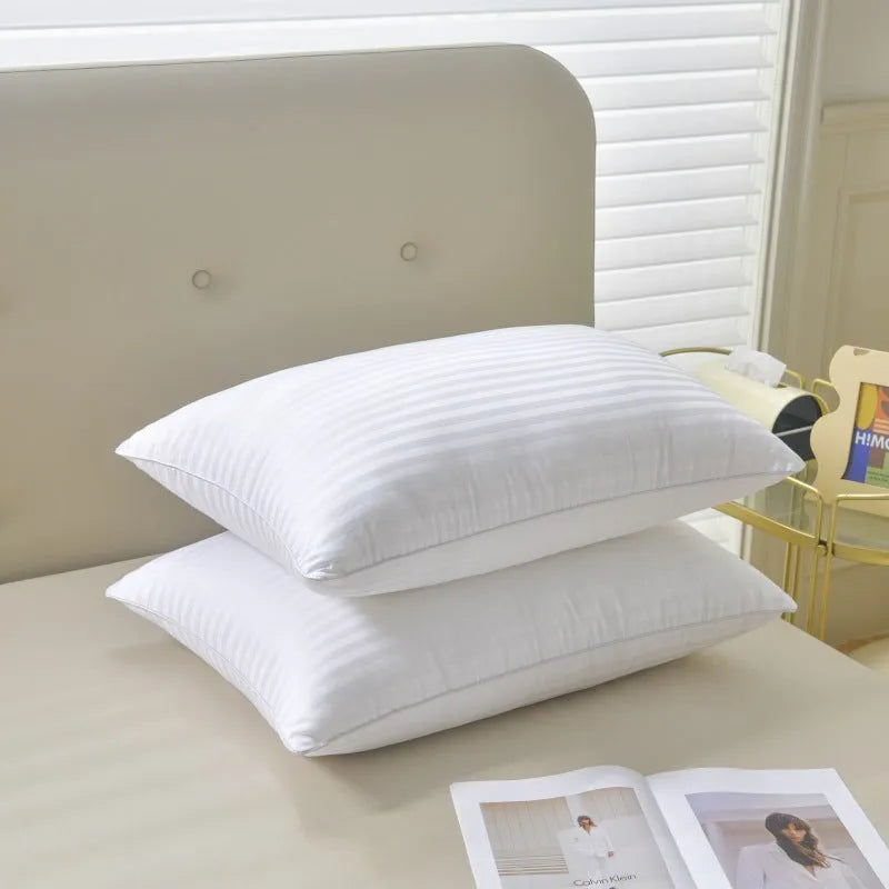 White cotton satin stripe pillow with feather and cotton fill, shown in three different sizes.
