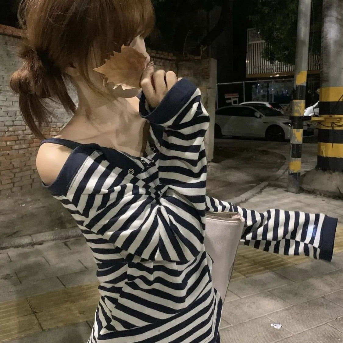 Dark blue oversized women's long-sleeved T-shirt with viscose fibre, featuring striped embroidery and button details in Korean style.