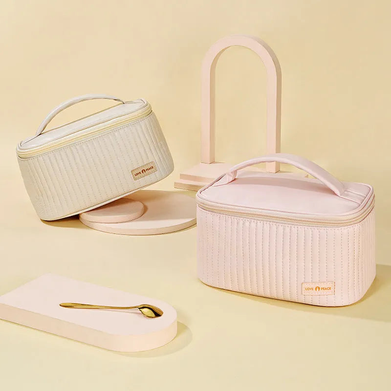 Open-top PU leather makeup bag in a choice of six solid colours.