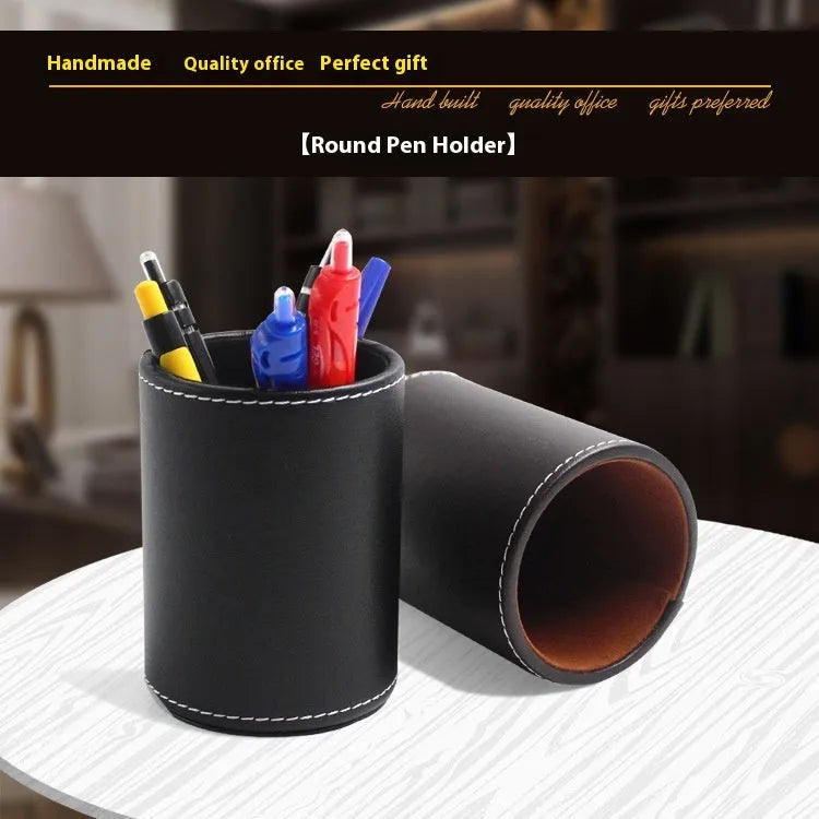 Round black leather pen container with 8.0cm diameter on wooden desk