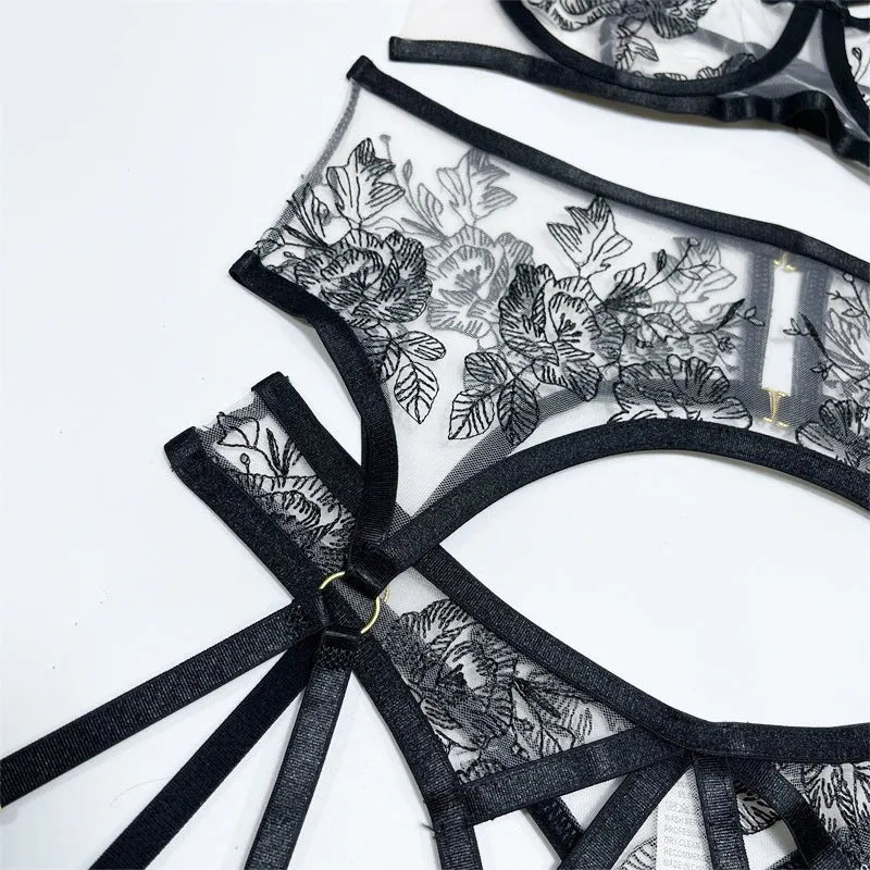 Women's black lace mesh three-piece set with floral print showing top, pants, and waist ring