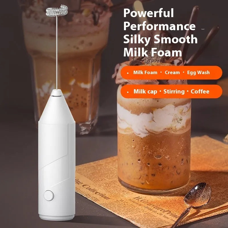 Mini handheld electric milk frother in black, white, or khaki colours with USB charging cable