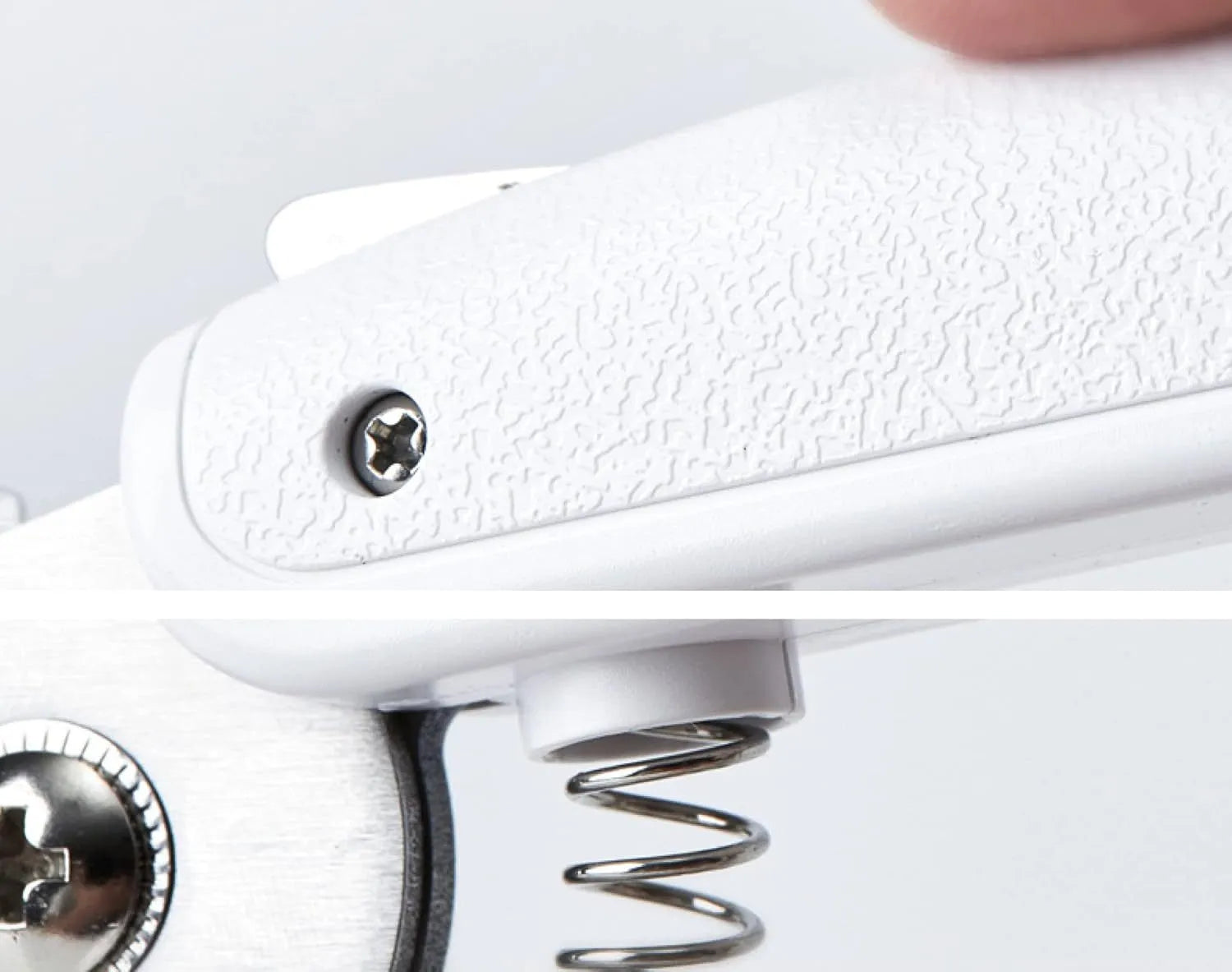 White LED pet nail clippers with transparent guard open, showing triangular steel blades and a nail file.