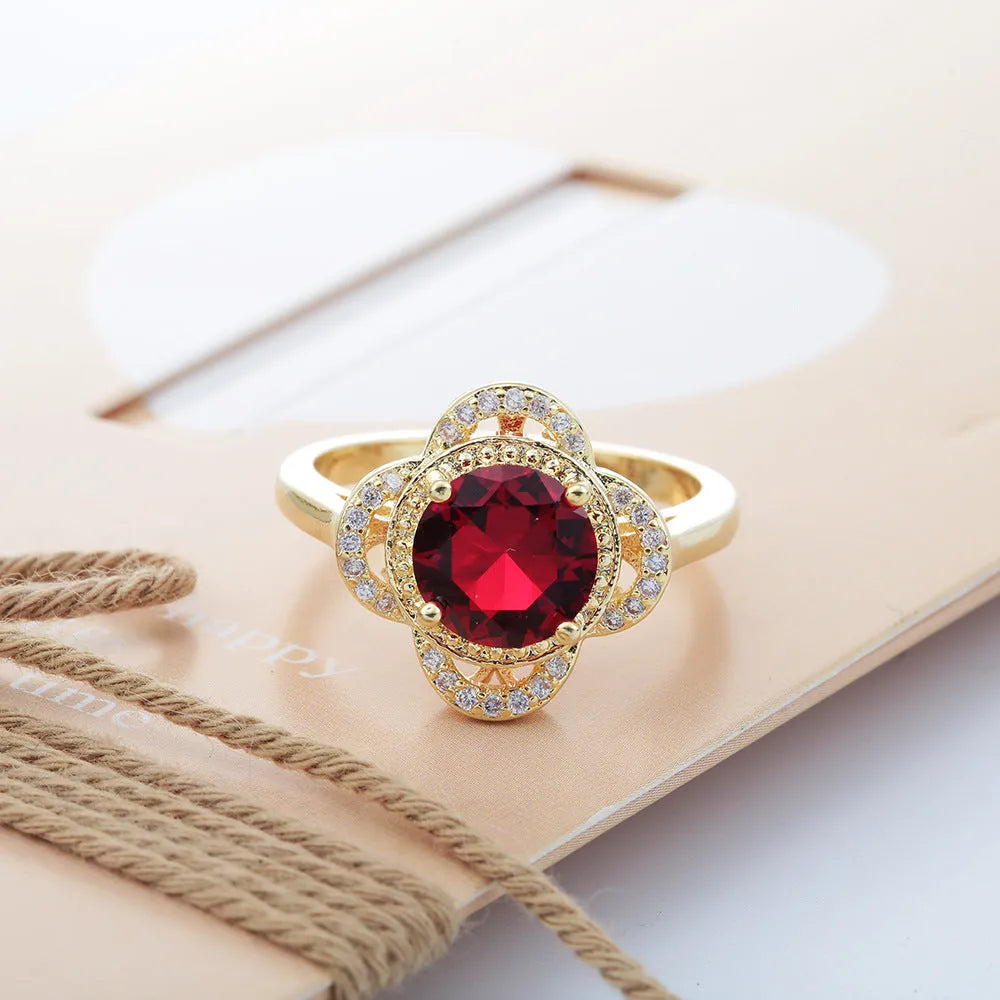 Copper ring with zircon inlay in fruit shape design on finger