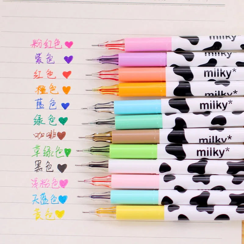 Cow-pattern gel pen set showing 12 different coloured pens with 0.38mm tips