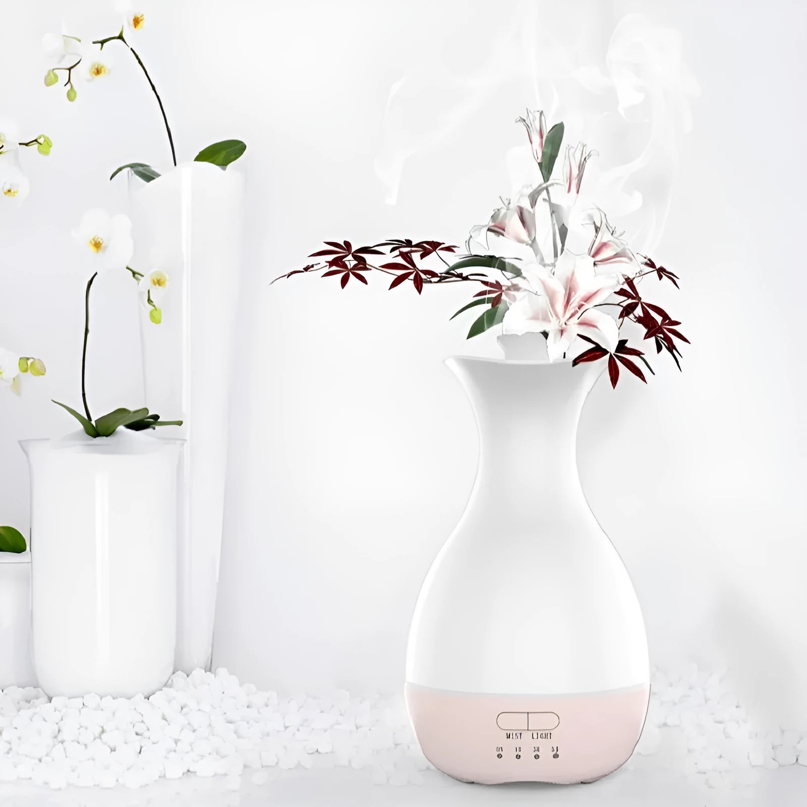 White or pink ultrasonic aromatherapy diffuser with 200ml tank capacity and coloured night light function