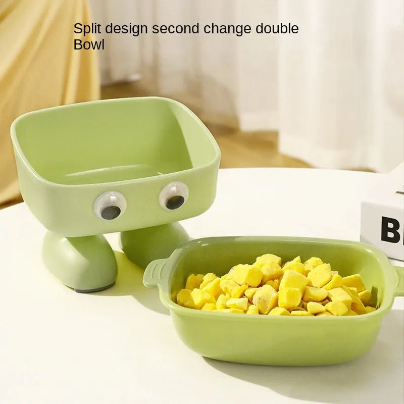 Robot-shaped elevated cat bowl with tilted feeding surface in green colour
