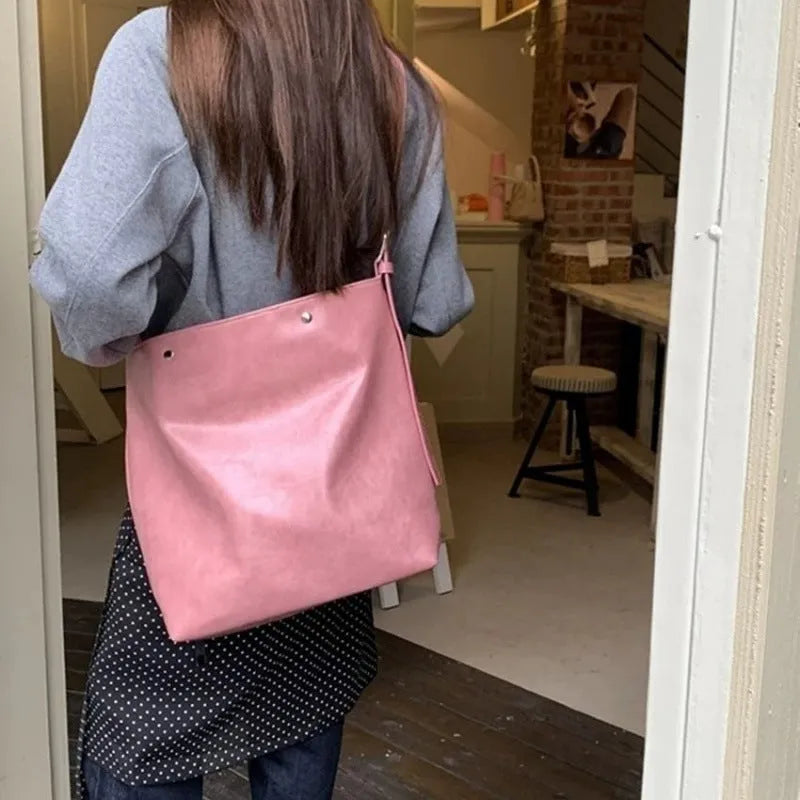 Corduroy one-shoulder commuter bag in pink or brown with PU lining