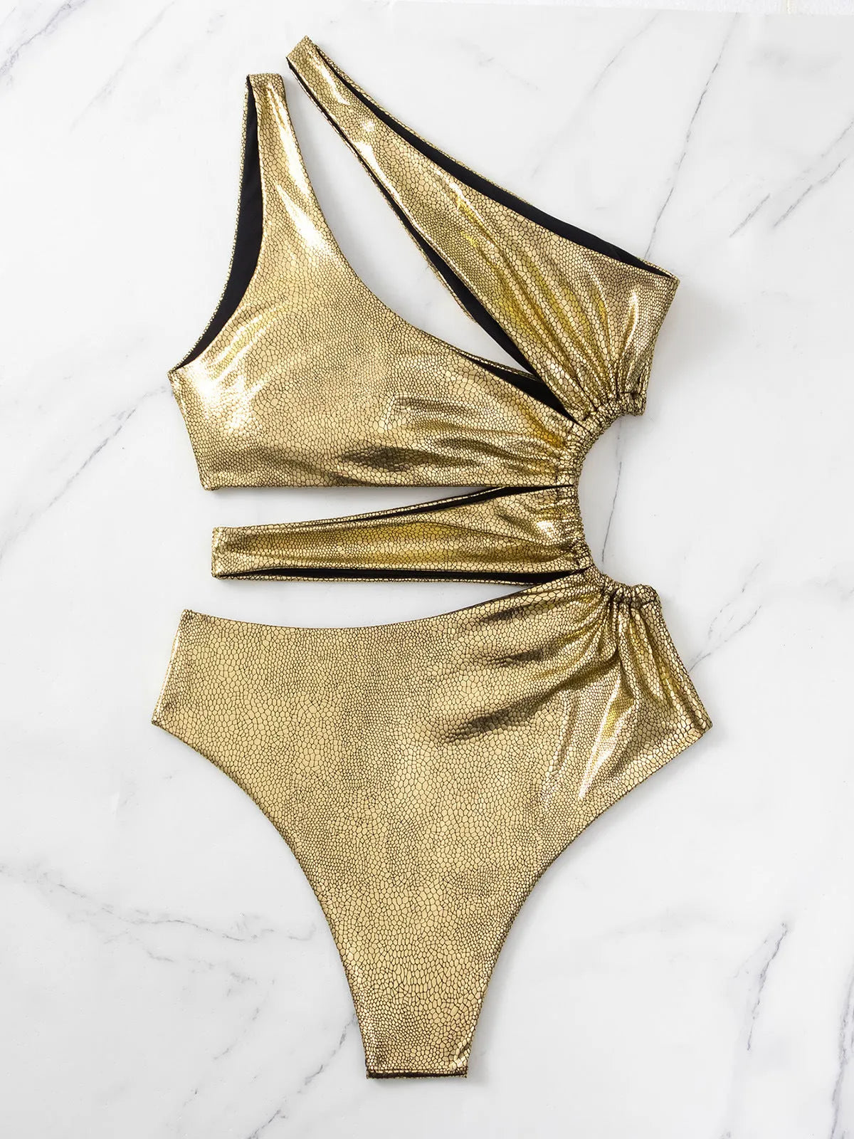 Women's gold one-piece swimsuit with backless design and high elasticity for swimming