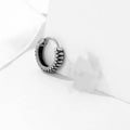 Round geometric retro twist earrings in titanium steel with stripe pattern, silver colour