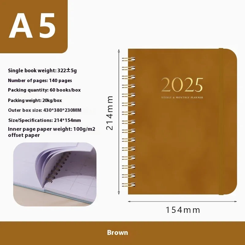 A5 size PU leather notebook with metal coil binding in a choice of colours including black, blue, brown, and pink.