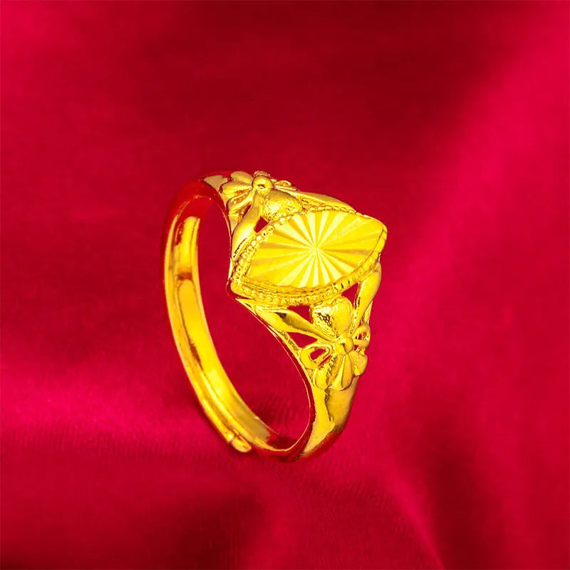 Gold electroplated brass ring with open diamond flower design and alluvial texture pattern