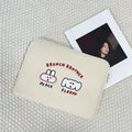 Embroidered laptop sleeve with animal design showing polyester construction and laptop size compatibility