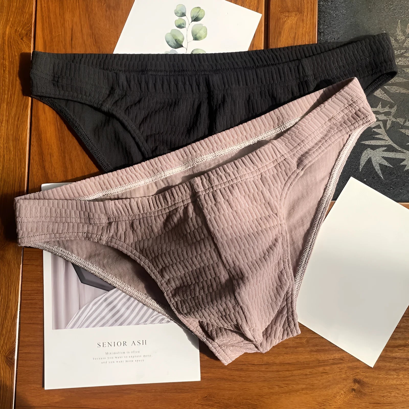 Men's solid colour pure cotton triangle briefs with a mid-waist waistband.