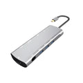 Grey aluminium USB-C docking station with HDMI, VGA, and USB ports