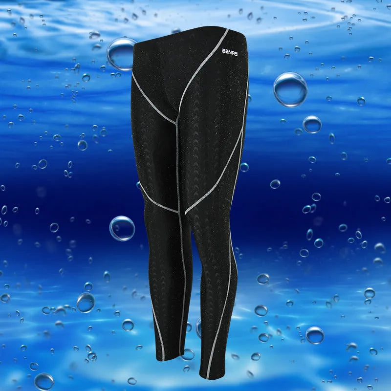 Men's black nylon cropped swimming trunks with a line detail, briefs style for swimming and sports.