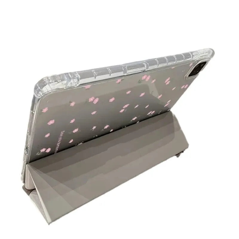 Transparent floral tri-fold tablet case for iPad showing magnetic closure and decorative pattern