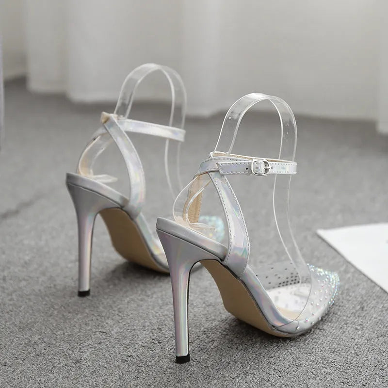 Women's pointed toe diamond sandals with a stiletto heel on a white background.