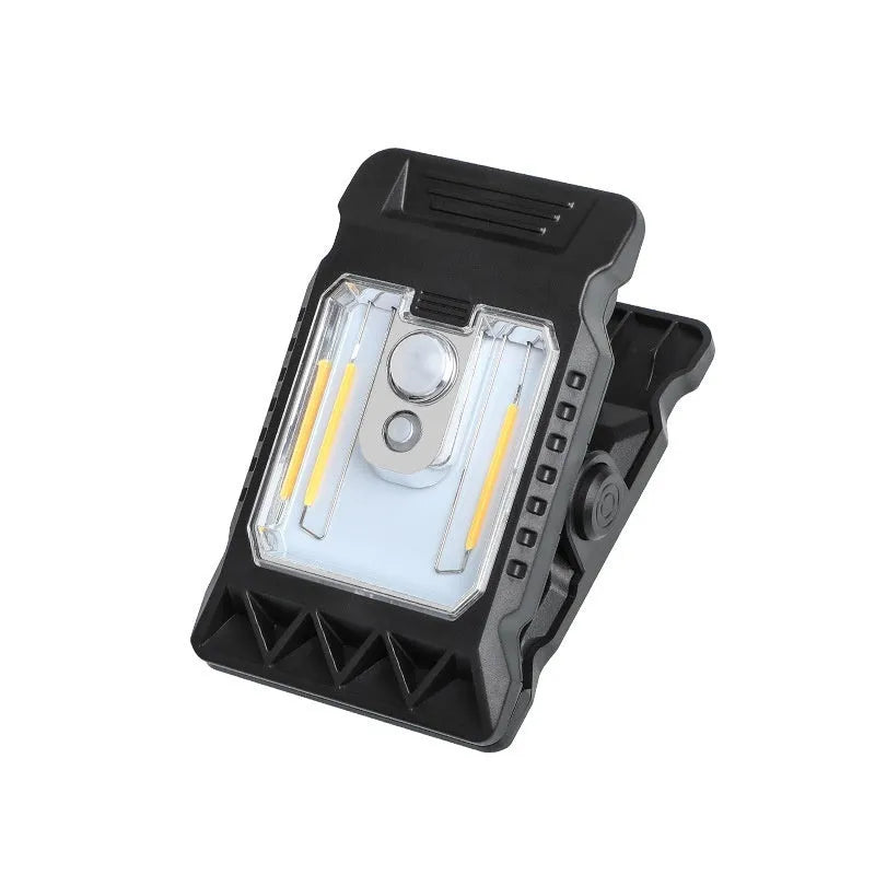 Compact motion-sensing clip lamp with white ABS housing mounted on shelf edge