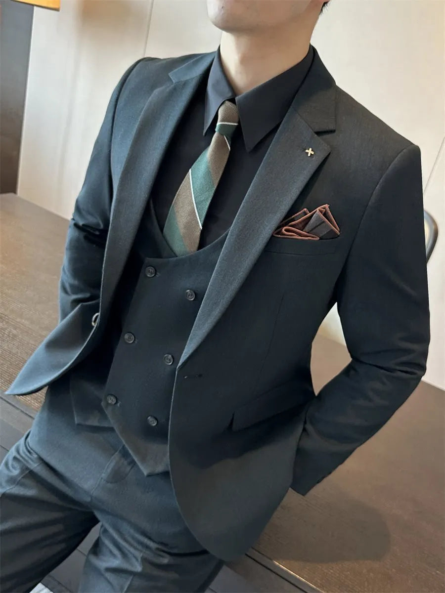 Man wearing a dark green slim fit business suit trousers, viscose blend fabric.