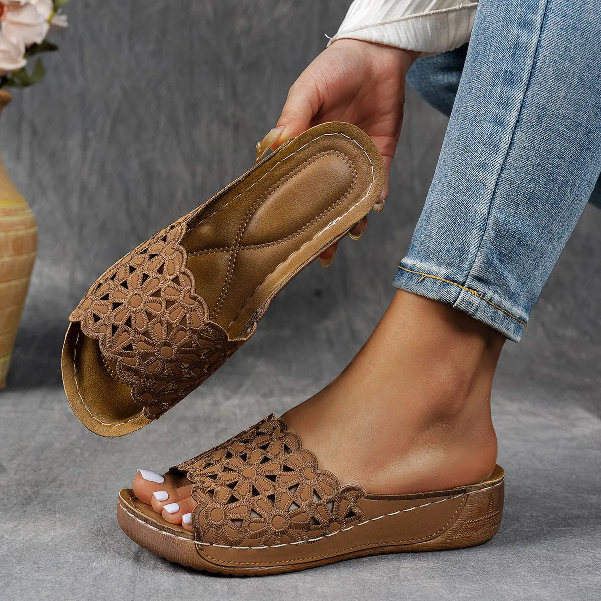 Women's wedge beach slippers with flower cutout detail and fish mouth toe shape in light brown