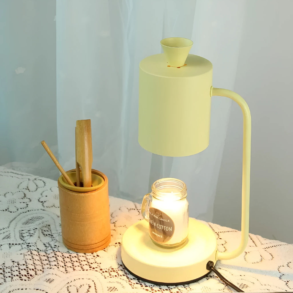 White European-style metal aromatherapy wax melt lamp with a dimmer switch on a table.