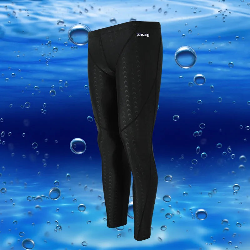Men's black nylon cropped swimming trunks with a line detail, briefs style for swimming and sports.