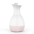 White or pink ultrasonic aromatherapy diffuser with 200ml tank capacity and coloured night light function