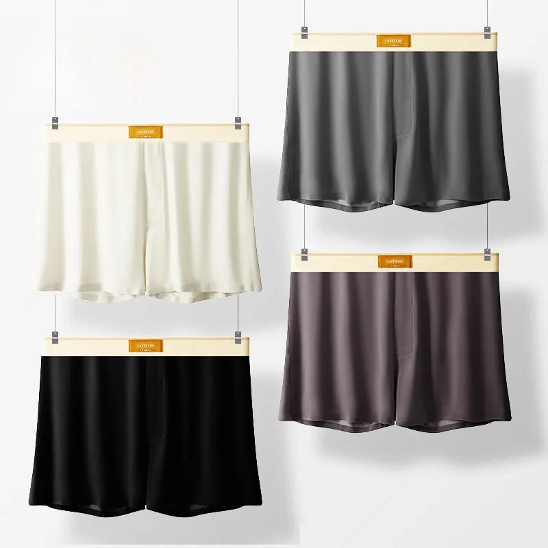Three pairs of men's solid colour loose fit ice silk underwear in various colour combinations