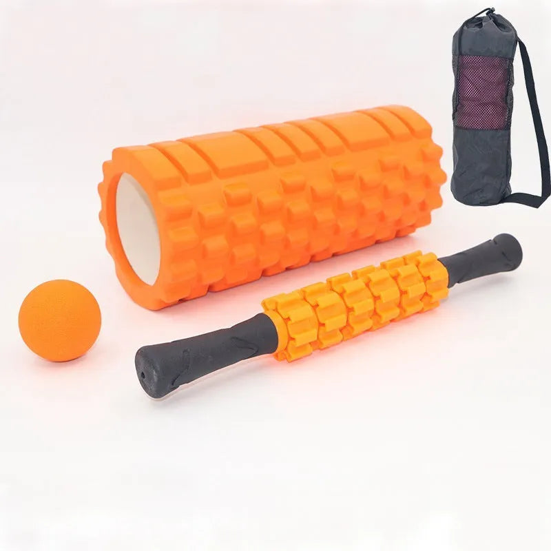 Black 33cm long fitness foam roller with six segmented pieces on a plain background.