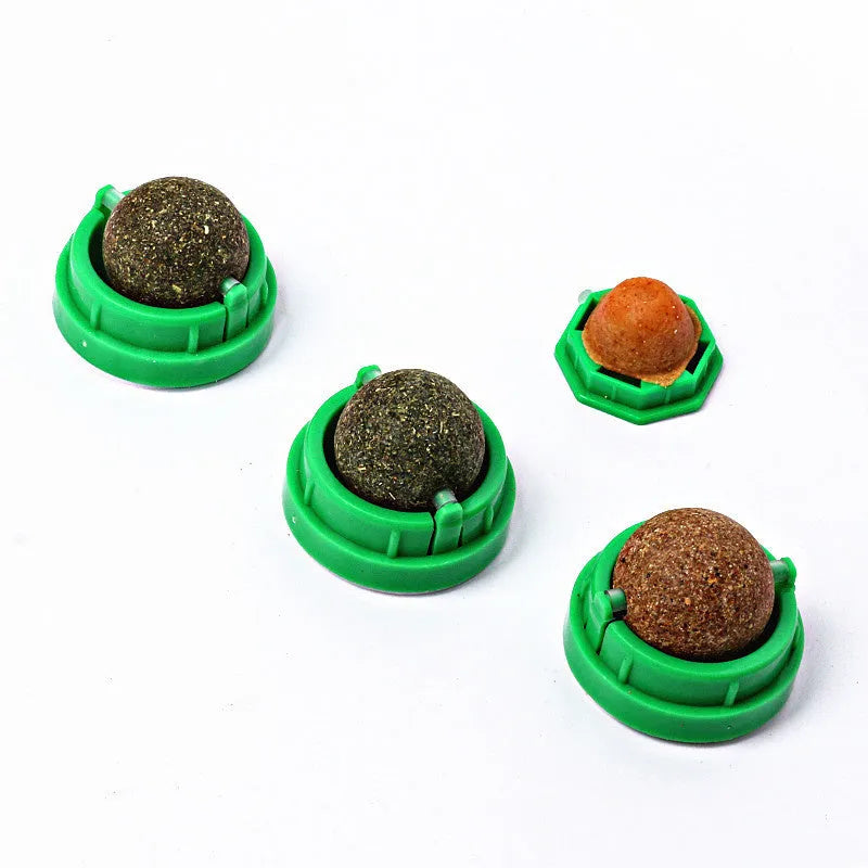 Plastic catnip ball toy in assorted colours including pink, blue, green, purple, grey, and white