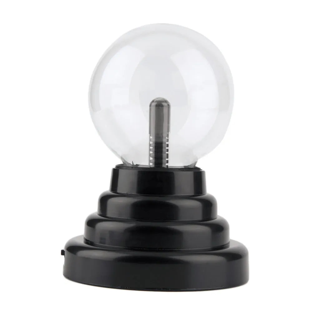 Magic light ball with colourful changing effects in 7.62cm glass sphere on ABS base