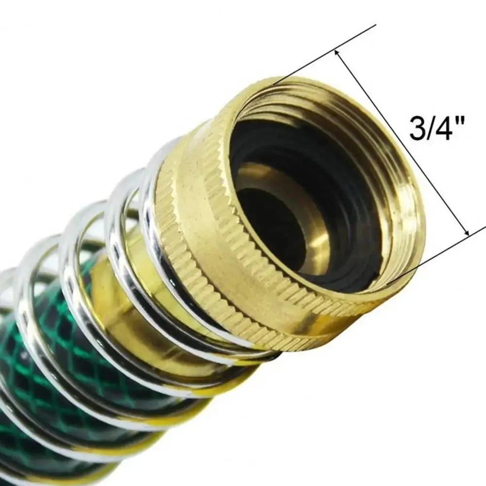 Brass garden hose connector with internal spiral spring, 15cm long with 3/4 inch threaded ends.