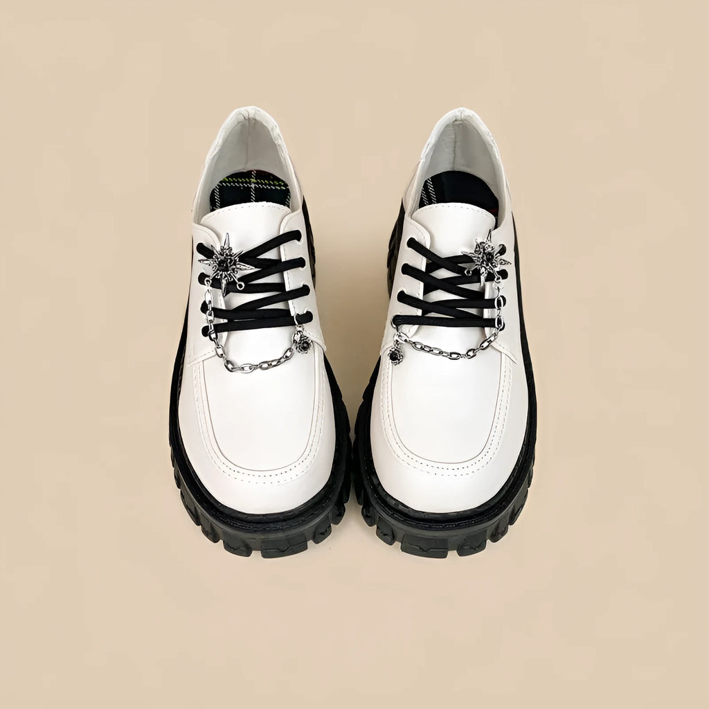 Women's Duke Asterism colour loafers with a metallic cross shoulder strap and round toe.