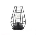 Minimalist wrought iron hollow table lamp in red wine glass style with warm white glow.