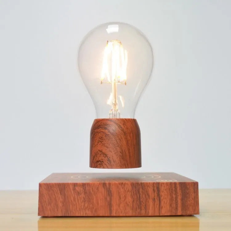 Magnetic levitation floating light bulb with imitation wood base and glass enclosure