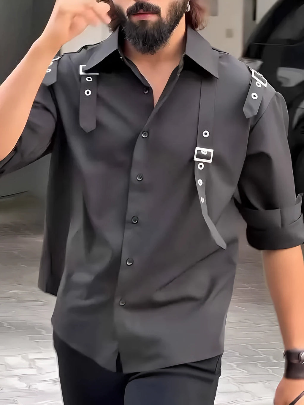 Black men's utility-style button-up shirt with a regular fit on a hanger.