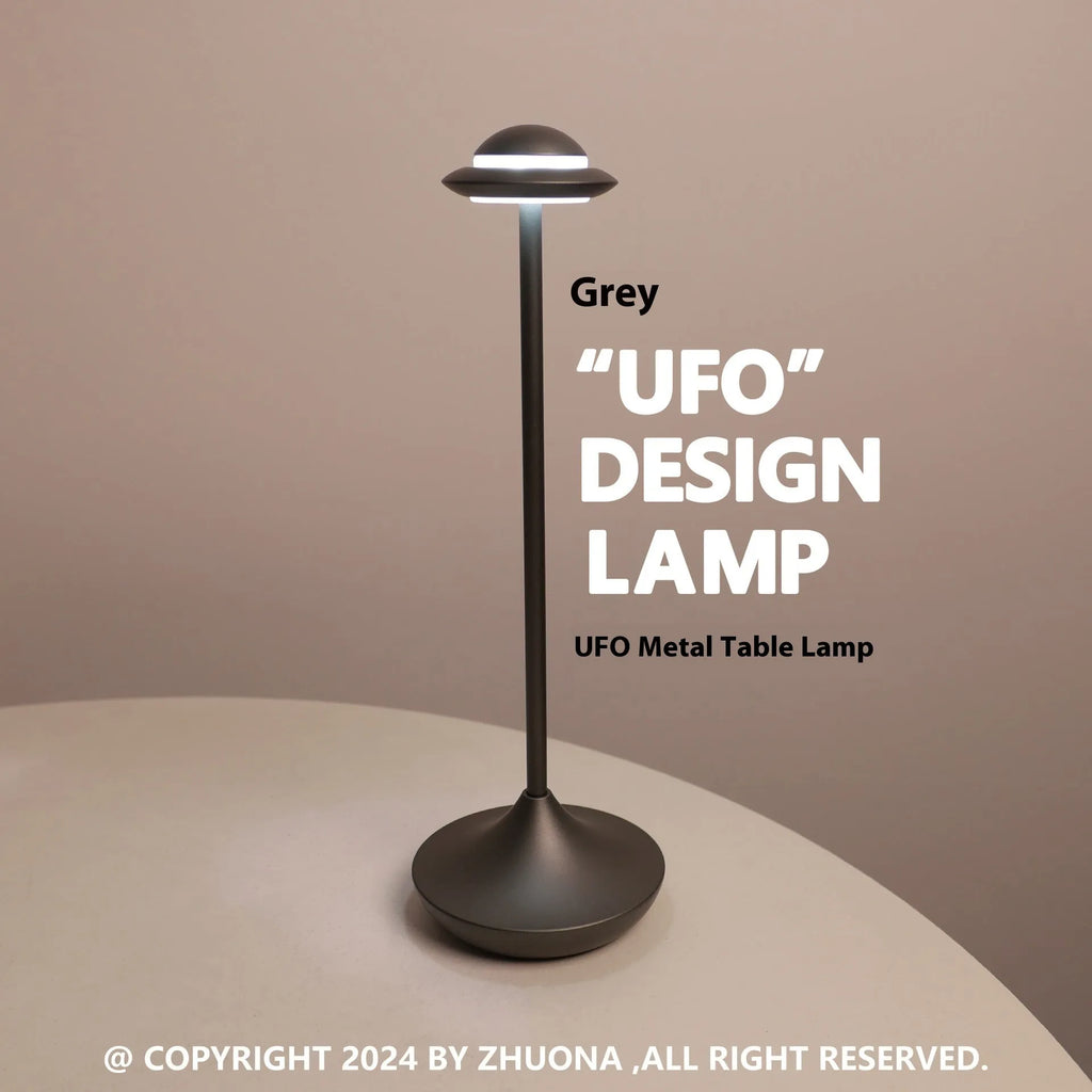 UFO-shaped metal table lamp with touch controls in black, gold or grey colour options