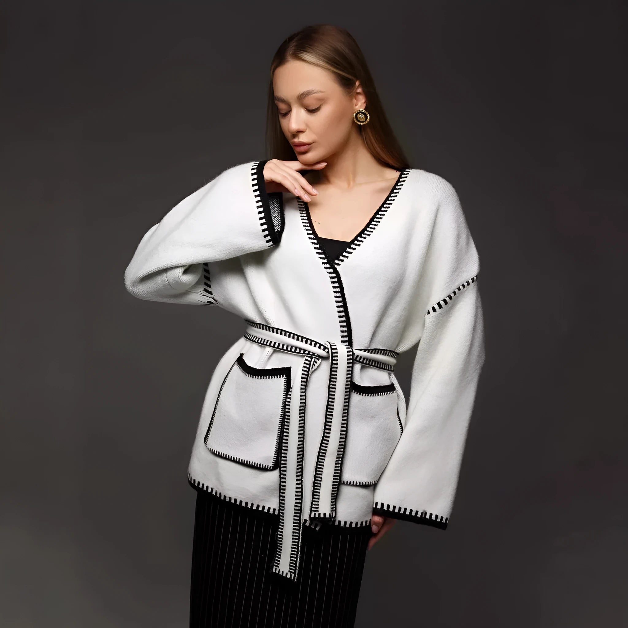 Loose mid-length knitted cardigan in imitation cashmere cotton fabric shown in black colour