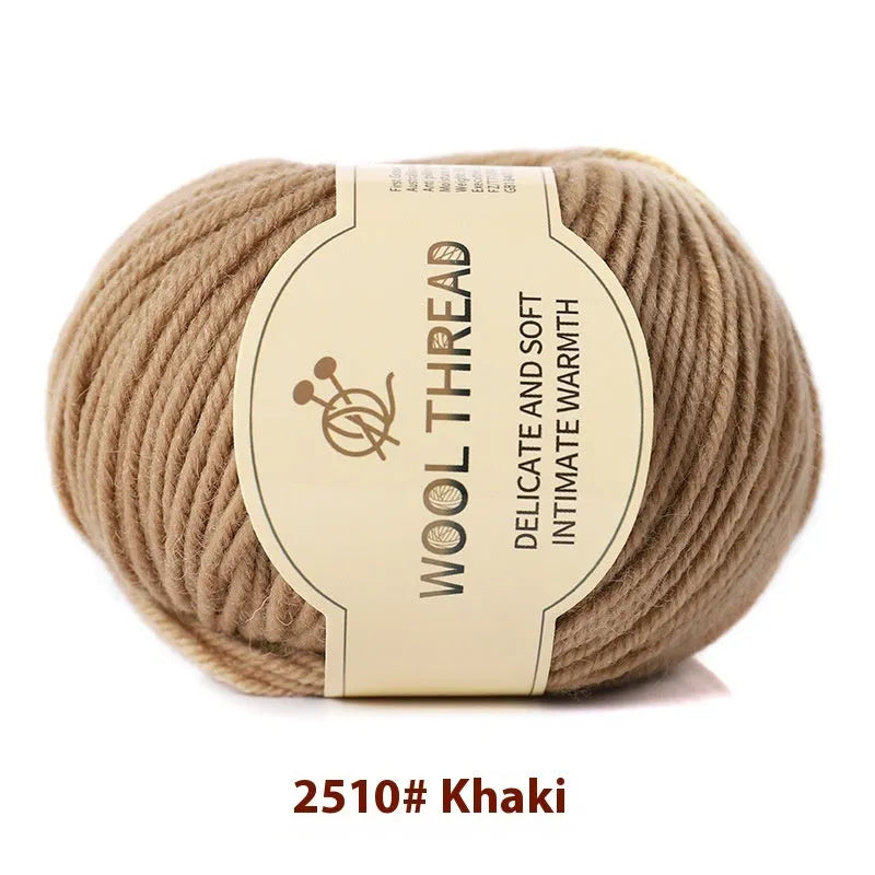 Roll of woolen hand knitting yarn in various colours including autumn fragrance green and bright red