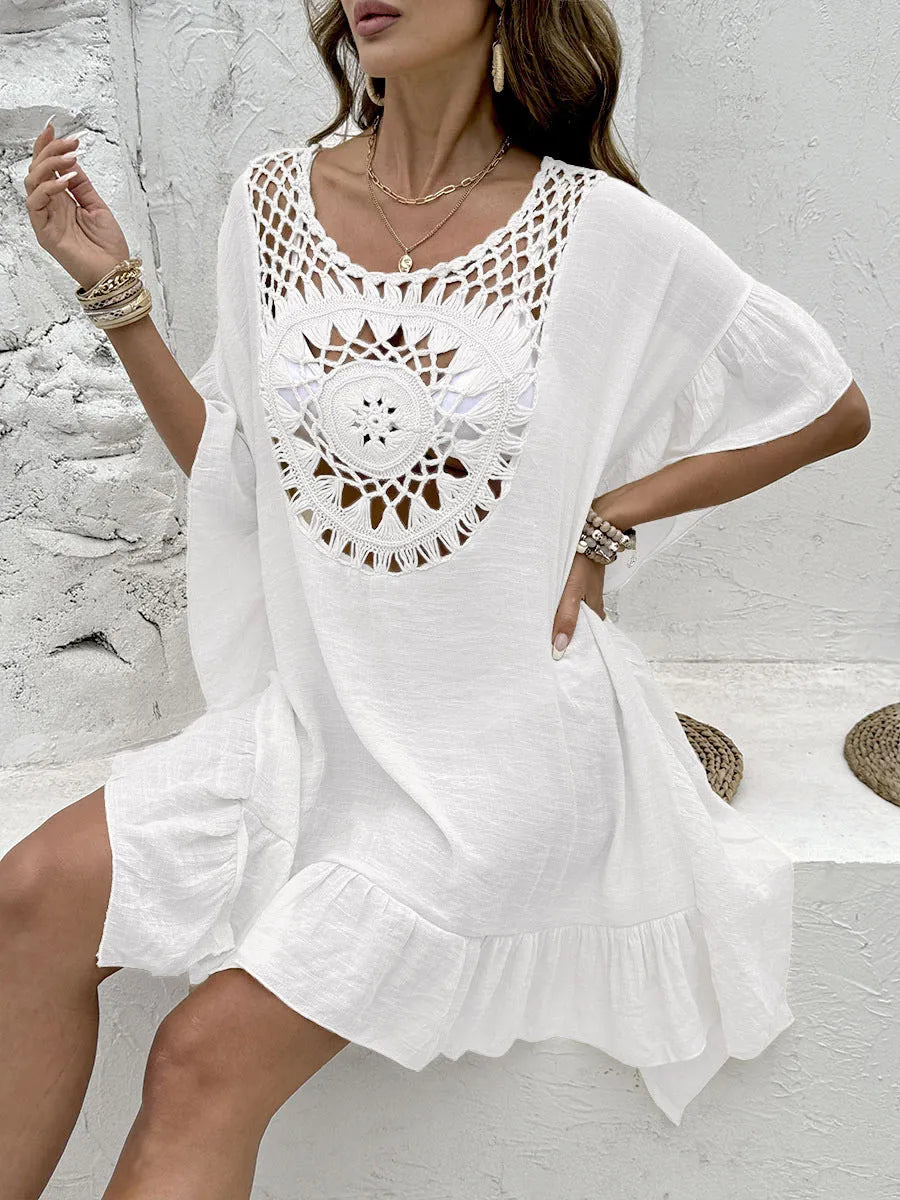 Beach dress swimsuit with crochet stitch patchwork skirt and tassel detail in apricot colour.