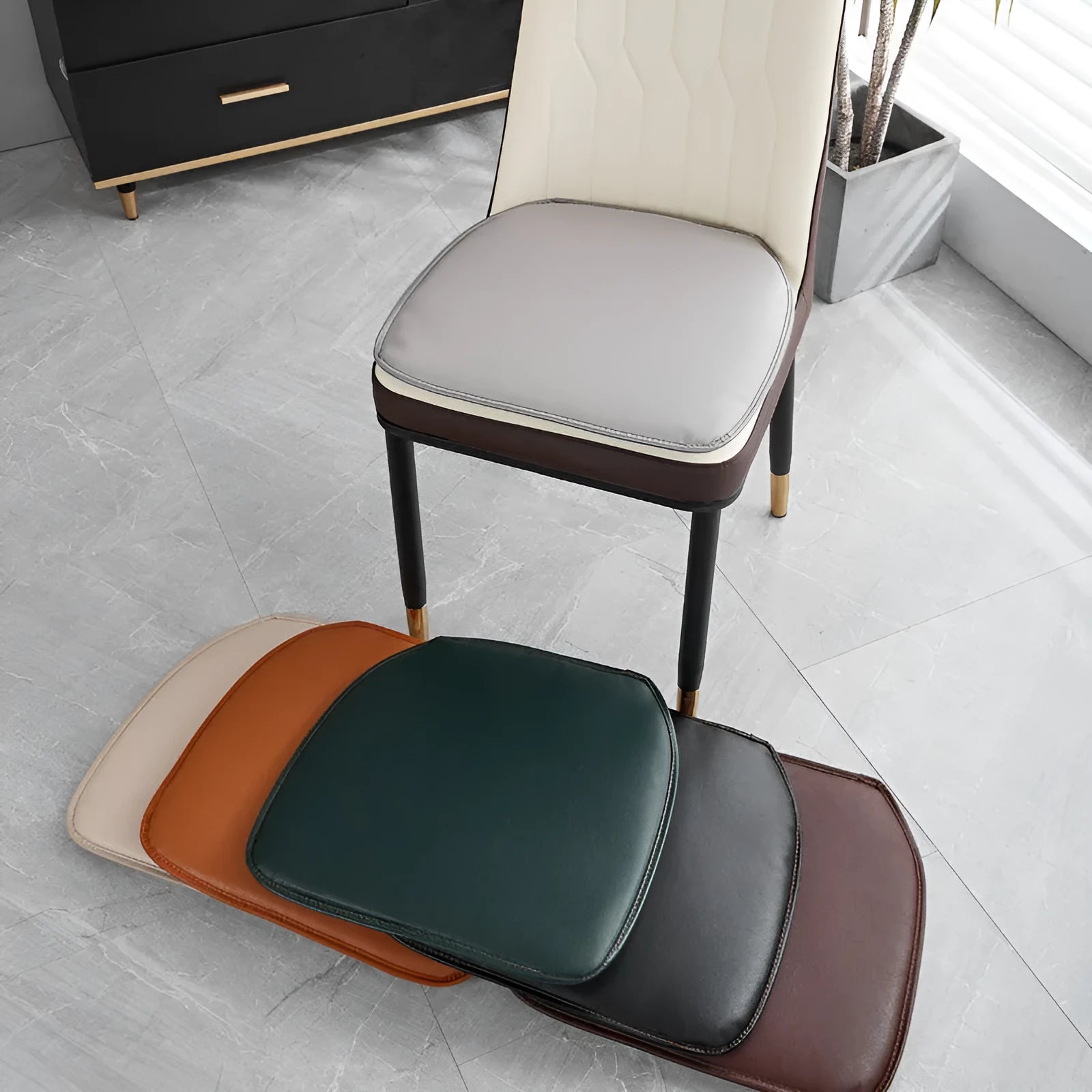 Leather horseshoe-shaped seat cushion shown in beige colour on wooden chair
