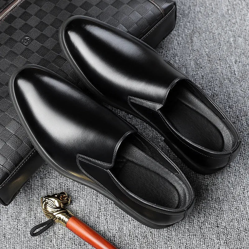 Men's black business casual slip-on shoes with a leather toe cap and sewing line detail.