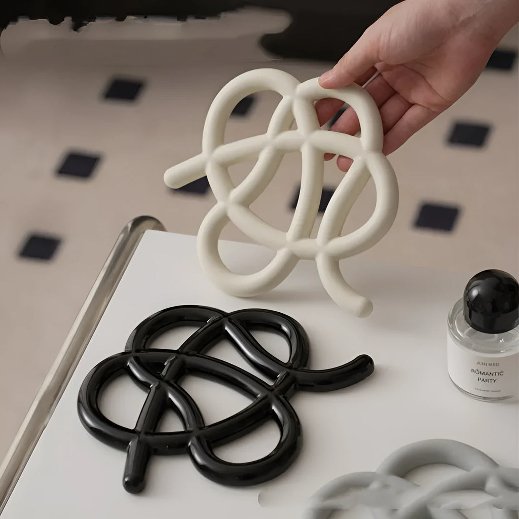 Ceramic heat proof mat in irregular shape with hook for hanging storage