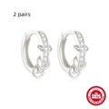 Sterling silver geometric stud earrings with circular design in gold or silver electroplated finish